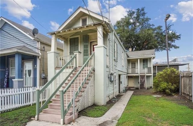 3026 Short St, New Orleans, LA 70125 - view of front of home featuring stairway and covered porch