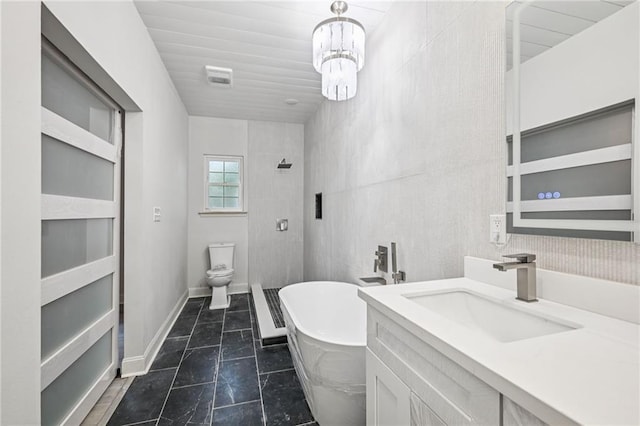 325 Jasmine Dr, Mandeville, LA 70471 - full bathroom featuring a soaking tub, vanity, a chandelier, and a shower