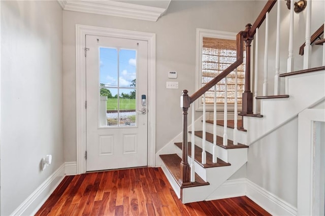 125 Broadway St, New Orleans, LA 70118 - foyer entrance with healthy amount of natural light, stairway, wood finished floors, and crown molding
