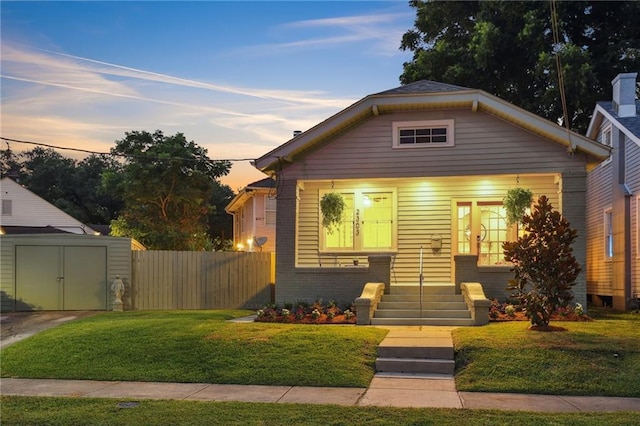 2303 Wisteria St, New Orleans, LA 70122 - bungalow-style home with a storage unit and brick siding