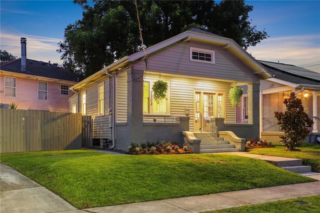 2303 Wisteria St, New Orleans, LA 70122 - bungalow-style home with brick siding and french doors