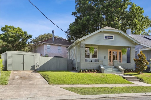 2303 Wisteria St, New Orleans, LA 70122 - bungalow-style house with a storage unit, brick siding, and driveway