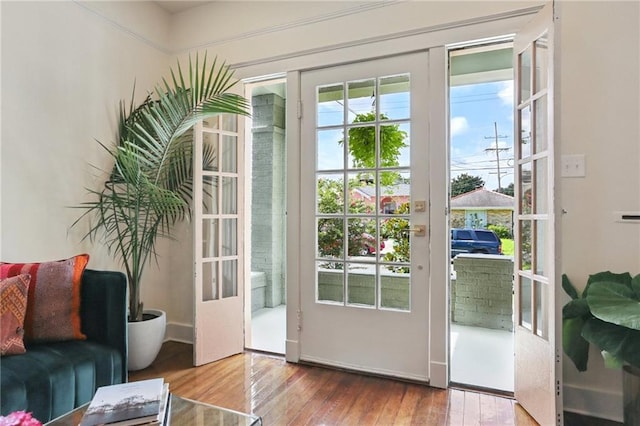 2303 Wisteria St, New Orleans, LA 70122 - doorway with french doors and wood-type flooring