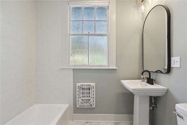 2303 Wisteria St, New Orleans, LA 70122 - bathroom featuring heating unit and toilet