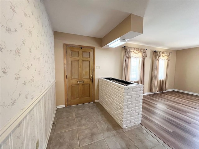 6012 Bridget St, Metairie, LA 70003 - kitchen with wallpapered walls and tile patterned floors