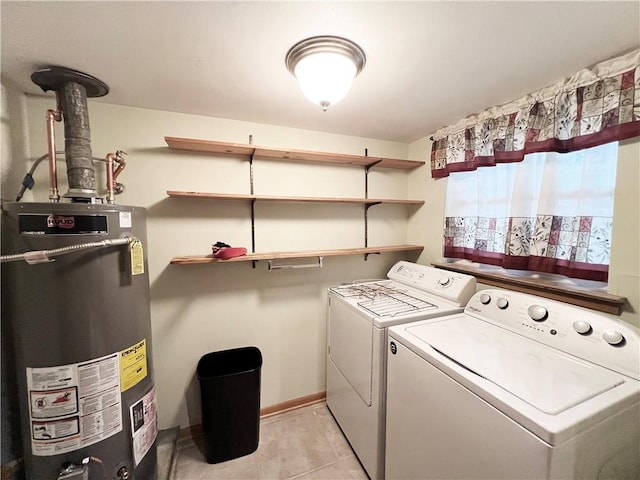 6012 Bridget St, Metairie, LA 70003 - laundry room with water heater, washing machine and clothes dryer, and light tile patterned flooring