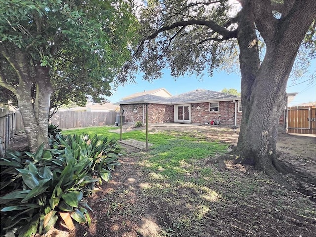 6012 Bridget St, Metairie, LA 70003 - fenced backyard featuring a patio area