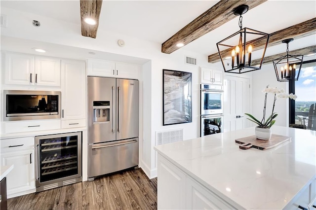 300 Lake Marina Ave Unit 14Dbw, New Orleans, LA 70124 - kitchen featuring stainless steel appliances, beverage cooler, a chandelier, beam ceiling, and dark wood finished floors