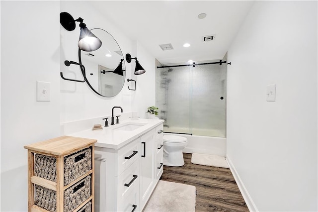 300 Lake Marina Ave Unit 14Dbw, New Orleans, LA 70124 - full bathroom with vanity, enclosed tub / shower combo, and wood finished floors