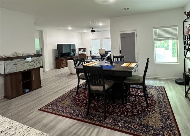 42423 Landing View Rd, Ponchatoula, LA 70454 - dining area with light wood-style flooring, ceiling fan, plenty of natural light, and recessed lighting