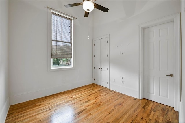 6978 Canal Blvd, New Orleans, LA 70124 - unfurnished bedroom featuring light wood-style flooring, a ceiling fan, and a closet