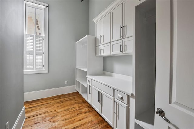 6978 Canal Blvd, New Orleans, LA 70124 - mudroom with light wood-style flooring and baseboards