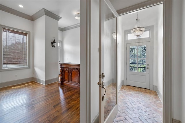 6978 Canal Blvd, New Orleans, LA 70124 - entryway with a chandelier, ornamental molding, and recessed lighting