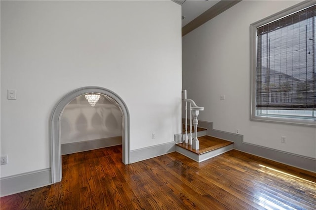 6978 Canal Blvd, New Orleans, LA 70124 - detailed view of wood finished floors and arched walkways