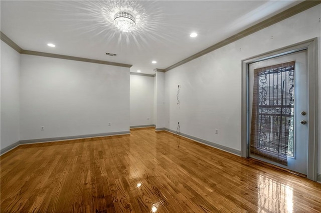 6978 Canal Blvd, New Orleans, LA 70124 - empty room with crown molding, light wood-style flooring, recessed lighting, and a chandelier