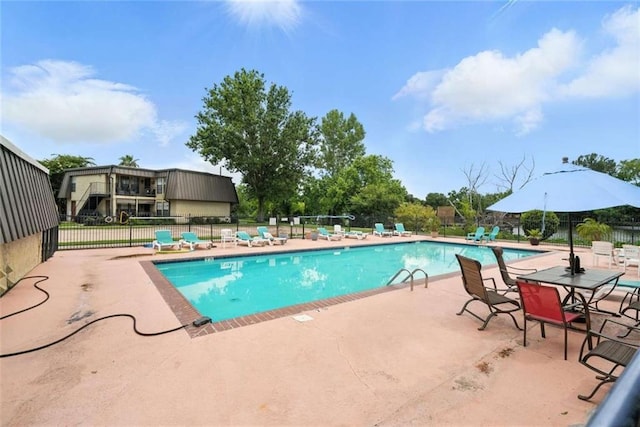 10286 W Winston Ave Unit 15, Baton Rouge, LA 70809 - community pool featuring a patio area