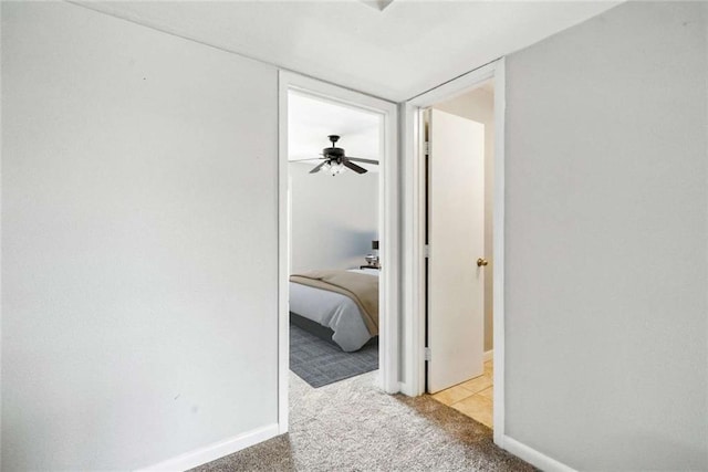 10286 W Winston Ave Unit 15, Baton Rouge, LA 70809 - hallway featuring carpet flooring and baseboards