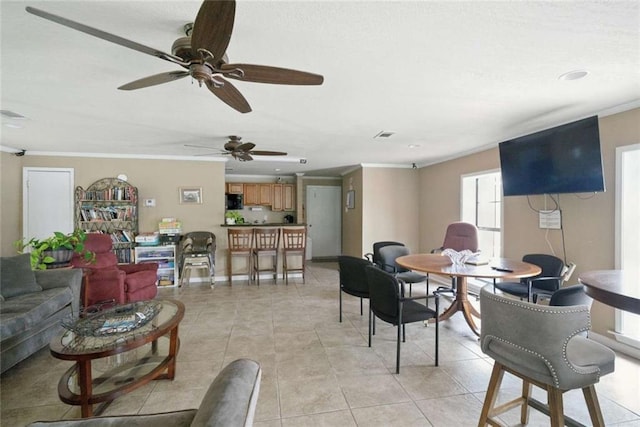10286 W Winston Ave Unit 15, Baton Rouge, LA 70809 - living area with ceiling fan, light tile patterned floors, and crown molding