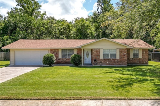 3542 Peachtree St, Slidell, LA 70458 - single story home with concrete driveway, brick siding, and a garage