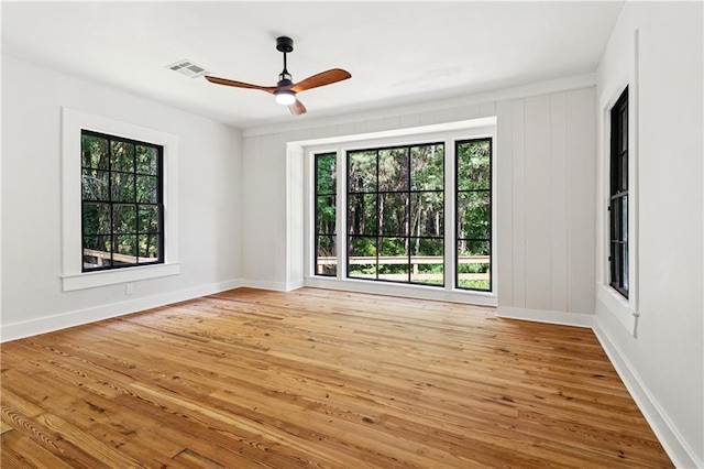 72287 Military Rd, Covington, LA 70435 - unfurnished room with light wood-type flooring and a ceiling fan