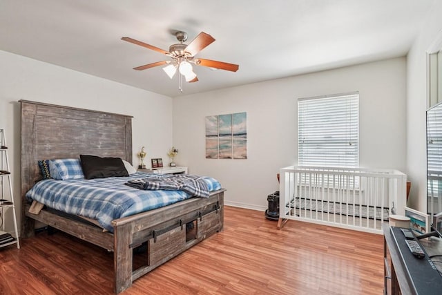 70105 10th St, Covington, LA 70433 - bedroom with wood finished floors and a ceiling fan