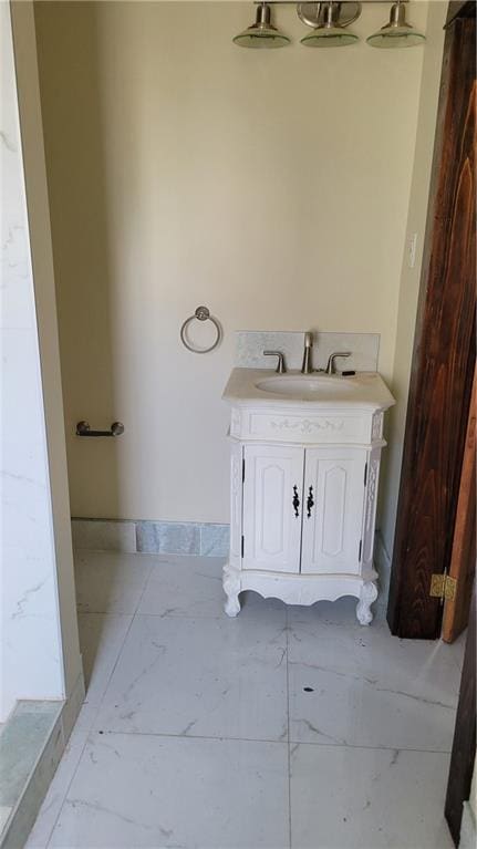 177375 N Dorgenois St, New Orleans, LA 70119 - bathroom featuring marble finish floors and vanity