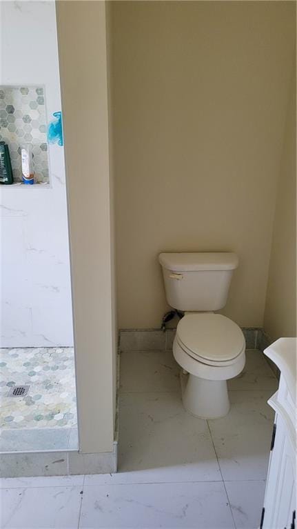 177375 N Dorgenois St, New Orleans, LA 70119 - bathroom featuring marble look tile flooring and vanity