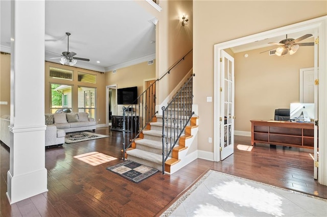 412 Aspen Ln, Covington, LA 70433 - entryway featuring a ceiling fan, ornamental molding, hardwood / wood-style floors, stairs, and french doors