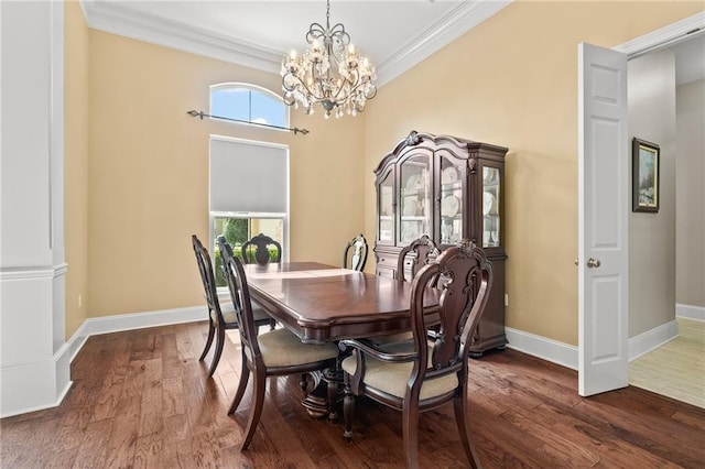 412 Aspen Ln, Covington, LA 70433 - dining space with a chandelier, crown molding, healthy amount of natural light, and wood finished floors