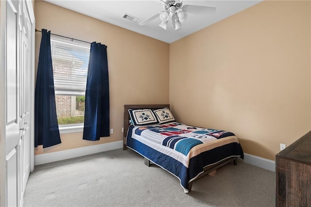 412 Aspen Ln, Covington, LA 70433 - carpeted bedroom with baseboards and a ceiling fan