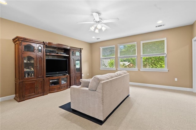 412 Aspen Ln, Covington, LA 70433 - living room featuring light carpet, a ceiling fan, and recessed lighting