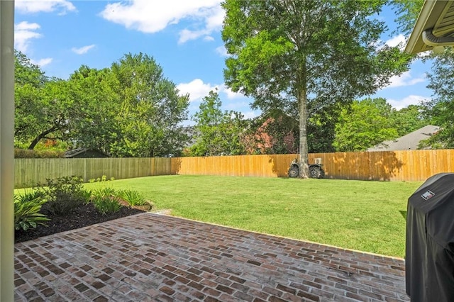 412 Aspen Ln, Covington, LA 70433 - fenced backyard featuring a patio area