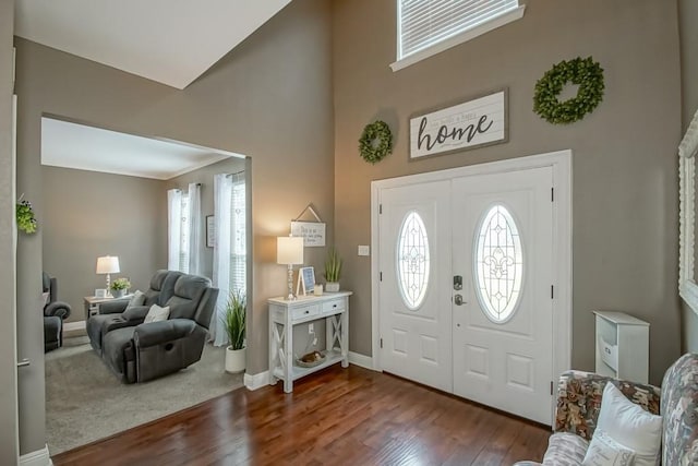 784 Lakeview Ln, Covington, LA 70435 - entrance foyer with dark wood-style floors, healthy amount of natural light, and a high ceiling