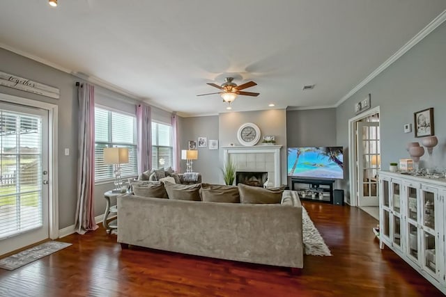 784 Lakeview Ln, Covington, LA 70435 - living area featuring ceiling fan, crown molding, a tile fireplace, dark wood-style flooring, and recessed lighting