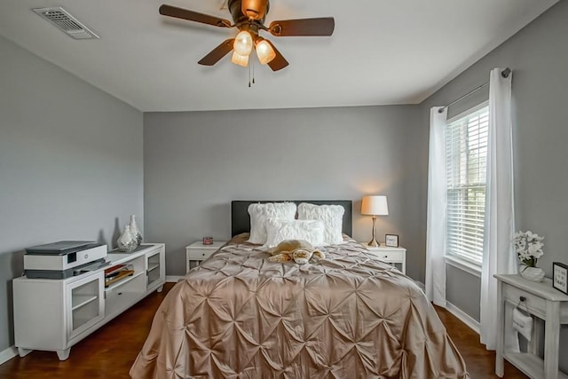 784 Lakeview Ln, Covington, LA 70435 - bedroom featuring ceiling fan and dark wood-style flooring