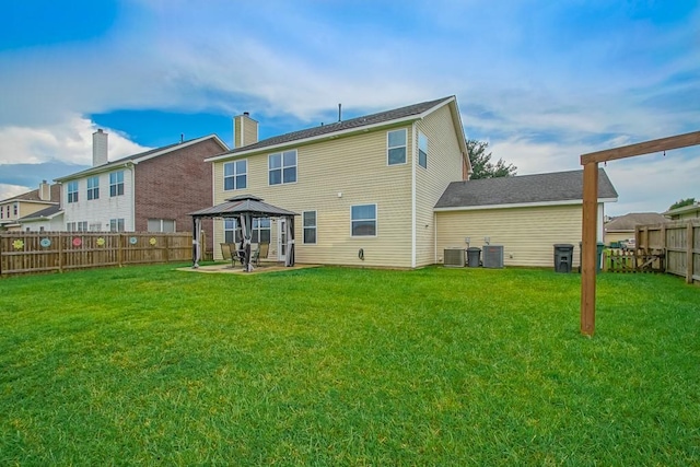 784 Lakeview Ln, Covington, LA 70435 - back of property featuring a gazebo, a fenced backyard, and a patio area
