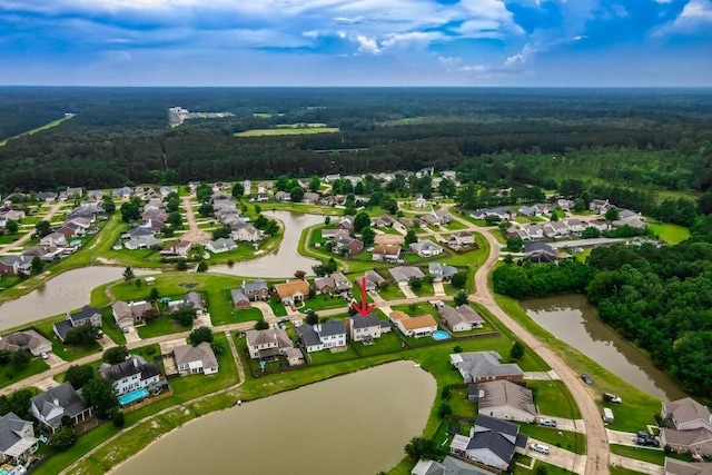 784 Lakeview Ln, Covington, LA 70435 - aerial overview of property's location featuring a heavily wooded area and nearby suburban area