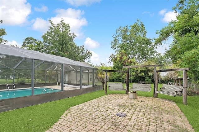 540 N 8th St, Ponchatoula, LA 70454 - view of patio / terrace with an outdoor pool and glass enclosure