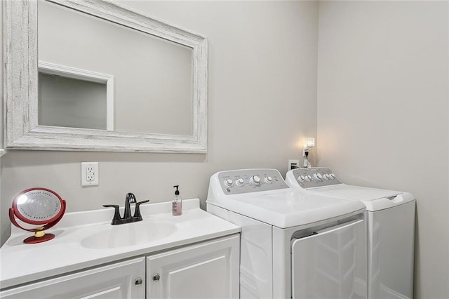 540 N 8th St, Ponchatoula, LA 70454 - laundry area with washing machine and clothes dryer and cabinet space