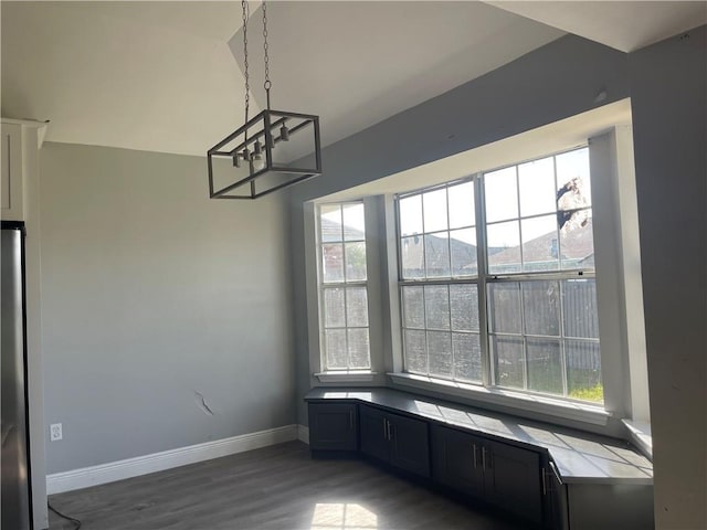 40 Cane Dr, La Place, LA 70068 - unfurnished dining area featuring a chandelier, healthy amount of natural light, and wood finished floors
