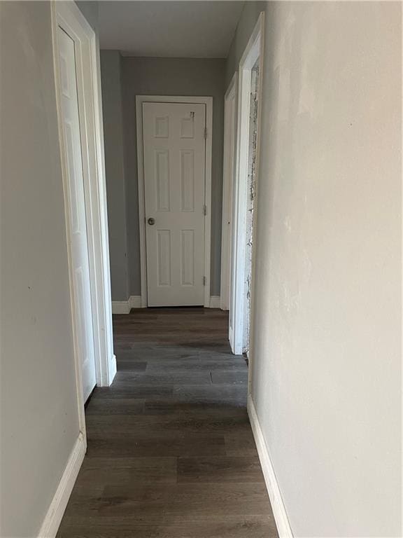 40 Cane Dr, La Place, LA 70068 - corridor with baseboards and dark wood-type flooring