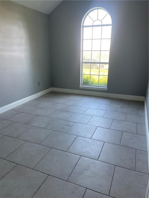 40 Cane Dr, La Place, LA 70068 - tiled empty room with baseboards