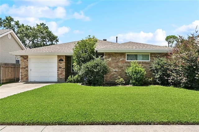 3514 Bore St, Metairie, LA 70001 - ranch-style home with concrete driveway, an attached garage, brick siding, and roof with shingles