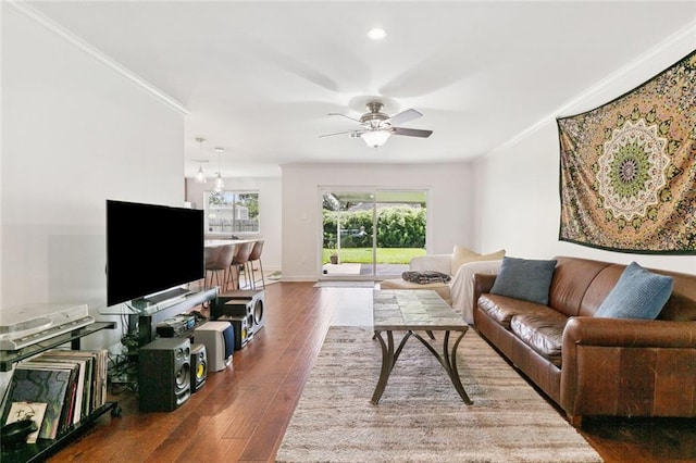 3514 Bore St, Metairie, LA 70001 - living area with ornamental molding, hardwood / wood-style floors, and a ceiling fan