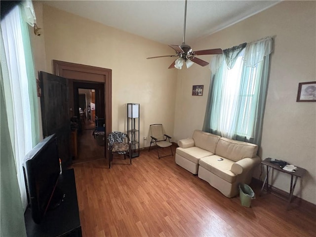 3120 Urquhart St, New Orleans, LA 70117 - living room featuring light wood-type flooring and ceiling fan
