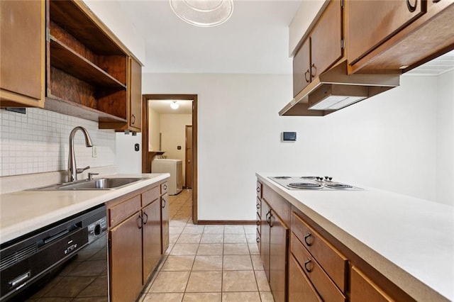 2608 Hyman Pl, New Orleans, LA 70131 - kitchen featuring dishwasher, stovetop, washing machine and clothes dryer, open shelves, and light countertops