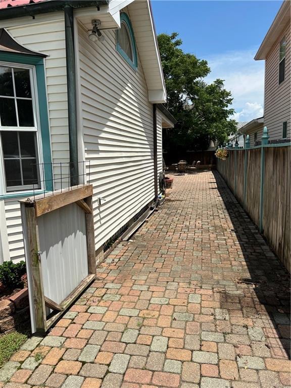 3821 Derbigny St, Metairie, LA 70001 - view of property exterior with a patio area