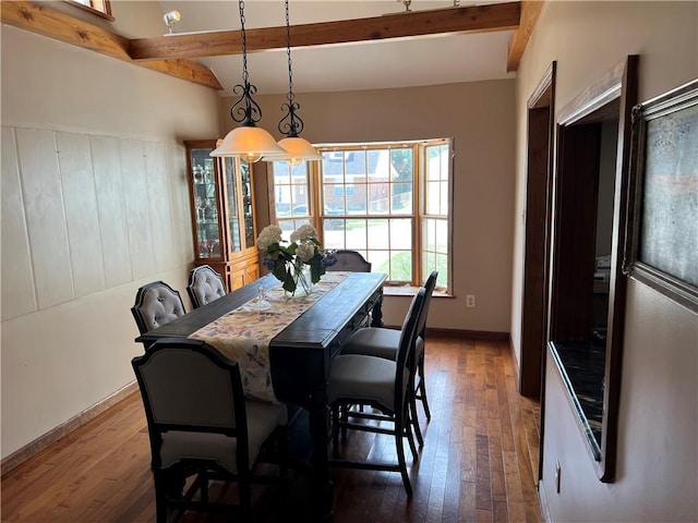3821 Derbigny St, Metairie, LA 70001 - dining space featuring hardwood / wood-style floors and beam ceiling