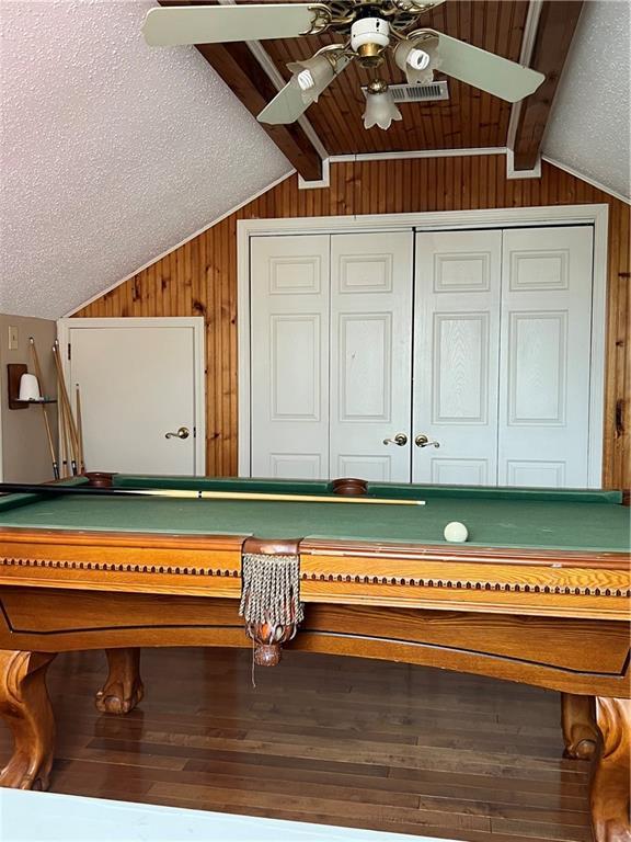 3821 Derbigny St, Metairie, LA 70001 - recreation room featuring billiards, a ceiling fan, wooden walls, and wood finished floors