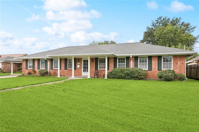 4827 Utica St, Metairie, LA 70006 - ranch-style home featuring brick siding, a porch, and a shingled roof